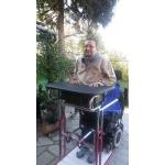 Atrezzo per mettere in piedi disabili